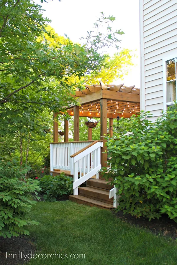 Deck and pergola with white railings