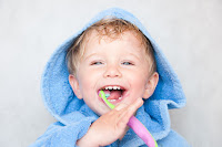 Milton Keynes dentist teach your child to brush their teeth