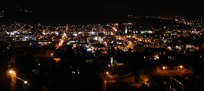 View of the city at night from the balcony