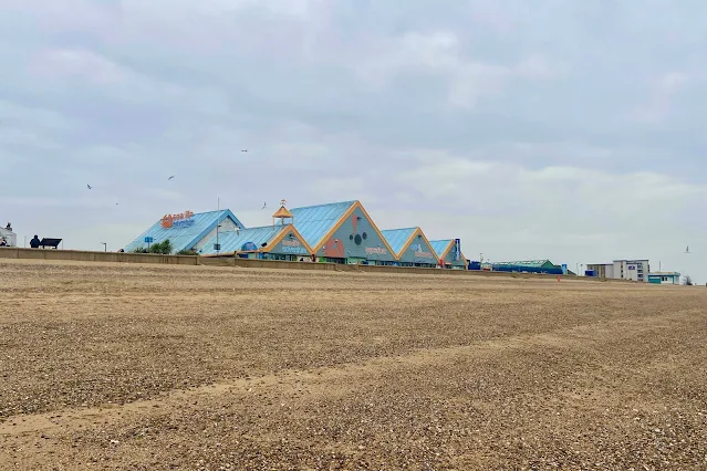 View from the sea across the beach to Sealife Adventure