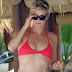 50 PHOTOS: Charlize Theron displays a “Red Bikini” in Hawaii, USA