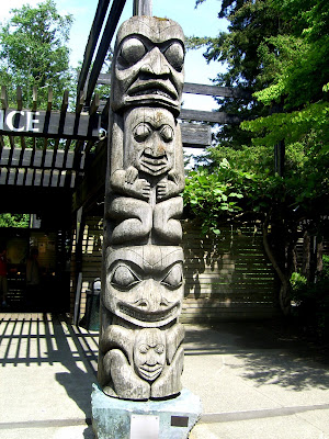 To The Gardens And A Closeup Of Totem Pole Thats On Right 300x400px