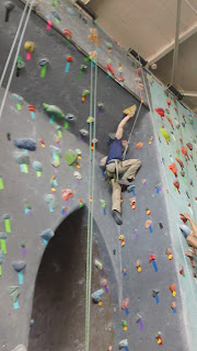 climbing the "Brooklyn Bridge" route at Brooklyn Boulders indoor climbing gym