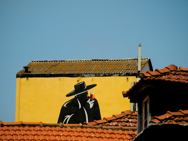 Cartel de la bodega Sandeman en Oporto