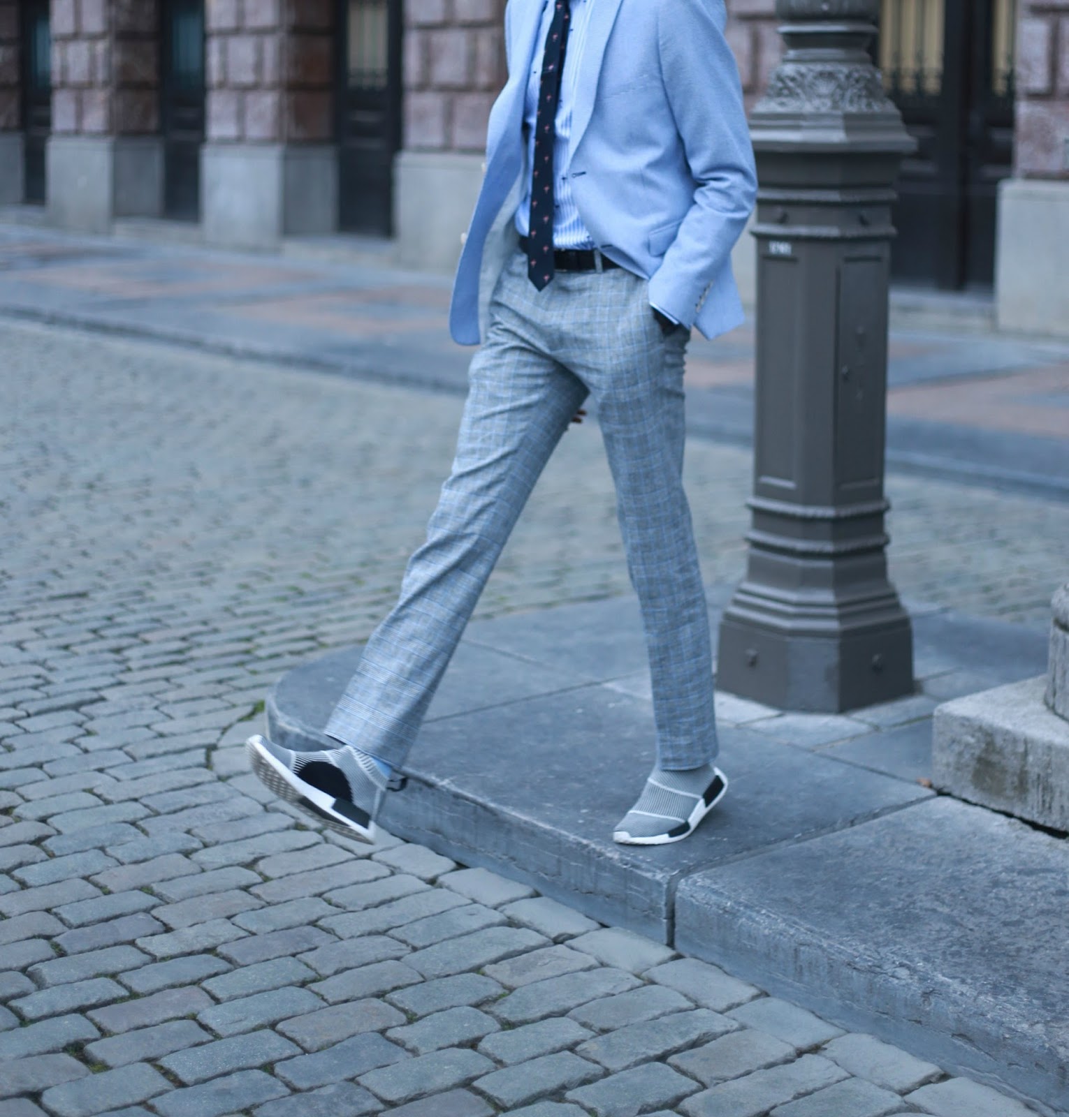 Business Chic men's look we fashion + adidas nmd sneakers // suits and sneakers - street style antwerp by jonthegold - photo by sofia dossantos