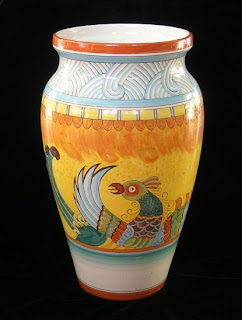 umbrella stand made from Majolica Italian pottery; bird of paradise pattern