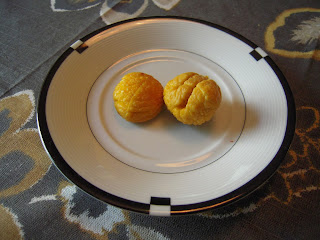 Photo of Two Chestnuts on a Plate