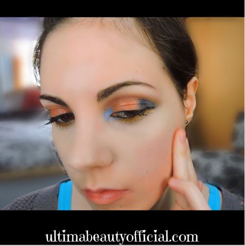 Ultima Beauty applying cream blush