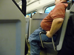 overweight man on train