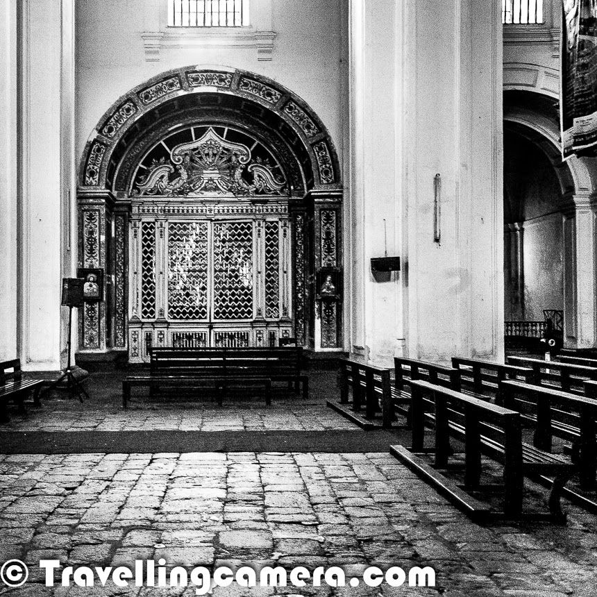 Different beaches come to our mind when we think about Goa, but Goa has many other interesting things to explore. And Old Goa has some of the beautiful architecture which takes you to a very different world. In this particular post, we are talking about two main churches situated in Old Goa - 'Se Cathedral' & 'Basilica of Bom Jesus'.The very first photograph of this Photo Journey shows entry to the Basilica of Bom Jesus which is located in old part of Goa. The Vasilica of Bom jesus is a UNESCO World Heritage Site. The Basilica holds the mortal remains of St. Francis Xavier. There aresome very interesting facts associated with this place and we recommend to find a guide to walk you through some of the interesting elements of The Basalica. It was third day of our Goa Trip, when we though of exploring Southern part of Goa. Old Goa is in southern region. From Panjim, one needs to drive through Goa Institute of Management to reach Se Catheral and Basilica of Bom Jesus. Both of these campuses are nearby and at walking distance. So we parked our car near Se Cathedral. Spent some time around the Cathedral and then walked to the Basilica.Se Cathedral is also known as The Se Catedral de Santa Catarina. This is the cathedral of the Latin Rite Roman Catholic Archdiocese of Goa. Supposedly it's considered as the largest church in India, which is dedicated to Catherine of Alexandria. Se Cathedral is one of the oldest and most celebrated religious buildings in Goa and is one of the largest churches in Asia as well.Above photograph shows the view of Cathedral from Basilica of Bom Jesus. Both of these are located across the road in Old Goa. Above photograph shows interiors of the Basilica of Bom Jesus. This church is located in Old Goa, which was the capital of Goa in the early days of Portuguese rule. 'Bom Jesus' name is used for the infant Jesus. The church is India’s first minor basilica which is considered to be one of the best examples of baroque architecture in India.Another view of Cathedral from Basilica. Cathedral's tower has a large bell which is popularly known as the 'Golden Bell' on account of its rich tone. There is an altar, which is dedicated to Catherine of Alexandria and there are various old paintings on both the sides. On the right hand side, there is a Chapel of the Cross of Miracles. Check out more about this cathedral at - http://en.wikipedia.org/wiki/Se_CathedralIf I try to summarize overall experience of Old Goa, it was more about Portuguese architecture. Both Se cathedral and Basilica of Bom Jesus are in a huge area and very well maintained. Both of these are very high buildings with some of the cool painting and sculptures. To me the marvelous architecture was beautiful thing to explore in Old Goahe architectural style of the Se Cathedral is Portuguese-Manueline. The exterior is Tuscan, whereas the interior is Corinthian. The church is very long &approximately 250 feet. And the breadth is bit more than 180 feet. Architecture was something that I could appreciate the most around this place & old Goa.This was shot inside the Basilica of Bom Jesus and wikipedia has very intersting details about it's architecture, which we missed exploring during the visit. Actually we had to go to Spice plantation on same day and didn't want to miss because of timings. Check out wiki link to know more about Basilica - http://en.wikipedia.org/wiki/Basilica_of_Bom_Jesus