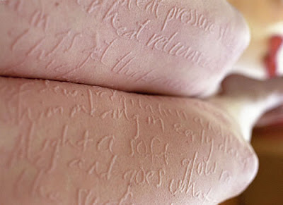 Woman�s Paper Skin a Walking Notepad