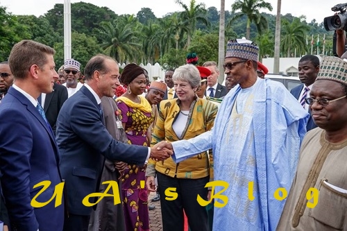 British PM, Theresa May Rocks Locally Made 'Akwete Cloth' From Abia State During Visit To Nigeria (Photos)