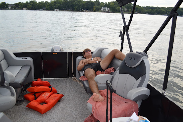 Josh sleeping on the boat