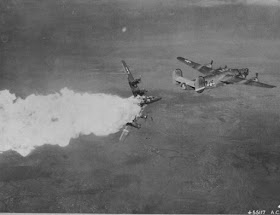 B-24H Liberator bomber exploding in midair after being hit by anti-aircraft fire over Germany, 1944.