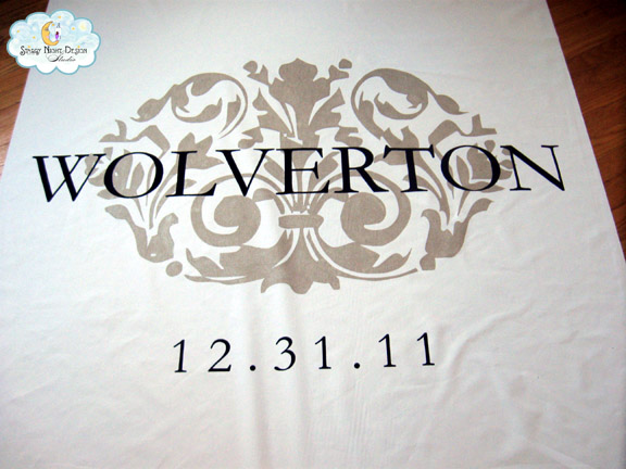 of the beautiful monogram aisle runner for Vanessa's New Year's wedding