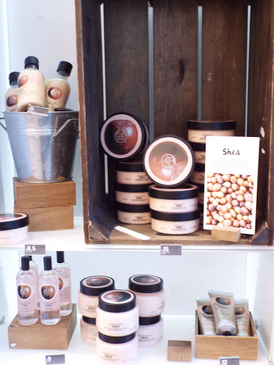 Full Shea Butter range on display, including shower cream, body butter, body mist, sugar body scrub and hand cream, at The Body Shop Liverpool.