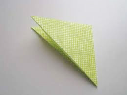Origami paper folded in triangle shape