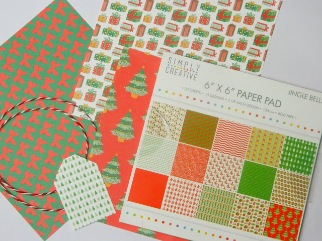 A Christmas Paper pad and supplies to make your own Christmas gift tags