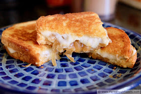 photo of a grilled cheese sandwich with caramelized onions, gorgonzola, and havarti cheese