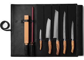 black leather knife roll, unrolled