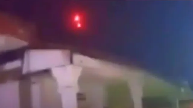 Here's the extraordinary video which shows a red UFO releasing small Orbs.
