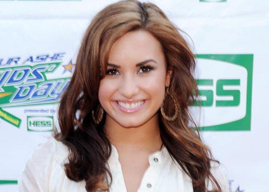 To the delight of fans Demi Lovato is determined to travel the world to do