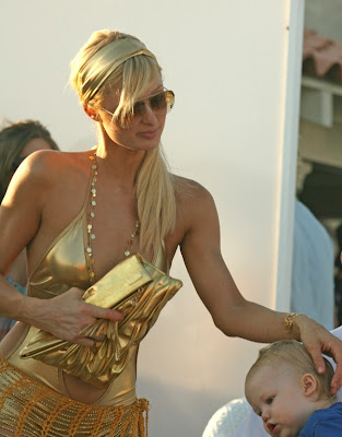 Paris Hilton Pictures GOLDEN BIKINI OUTFIT from  Malibu Beach House