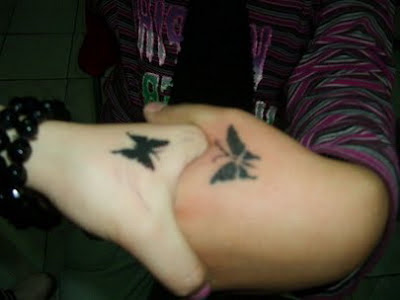 hand butterfly tattoos gallery