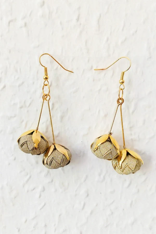 pair of 3D round origami fruit earrings made of metallic light gold paper with metal leaves and golden earwires