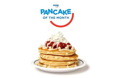 A full stack of IHOP's White Chocolate Raspberry Pancakes.