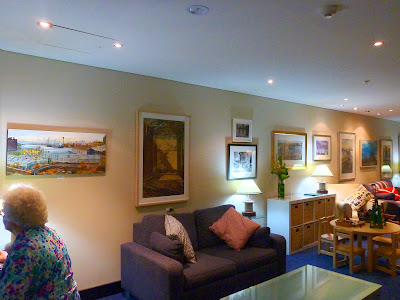 exhibition of Pyrmont paintings by industrial heritage artist Jane Bennett in the members lounge of the Australian National Maritime Museum