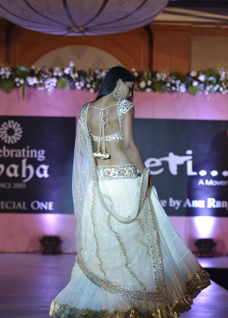 Nia Sharma in White Lehenga Choli at Beti show by Anu Ranjan