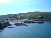 . Canal desde la costa de su lado derecho situada por delante de la playa. (playa de san juan de la canal )