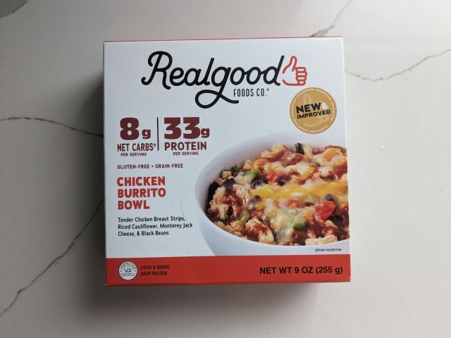 The packaging for Real Good Foods' Chicken Burrito Bowl.