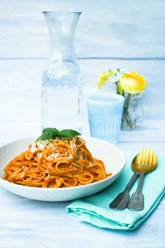 Red Pepper and Olive Spaghetti in a white pasta bowl