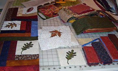 Everything laid out on the cutting table for leaf quilt.