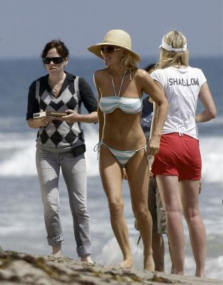 Jenny McCarthy bikini swimsuit green and white stripe halter tie neck