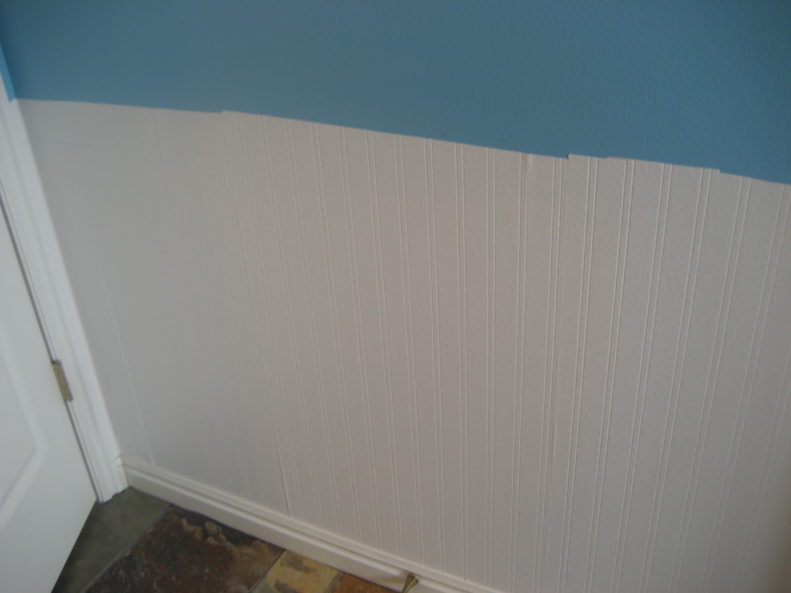 This is bead board wallpaper- I love that it is so cheap and easy to ...