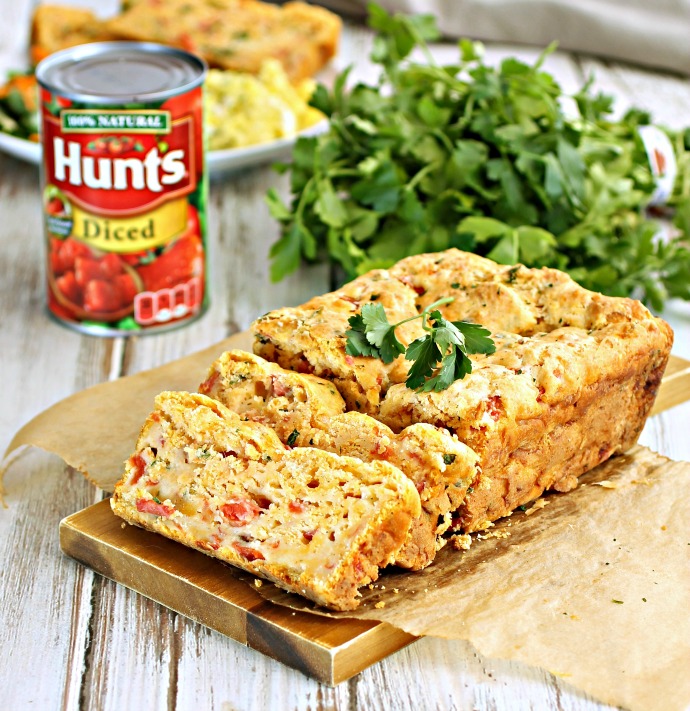 Recipe for a savory quick bread flavored with tomatoes and cheese.