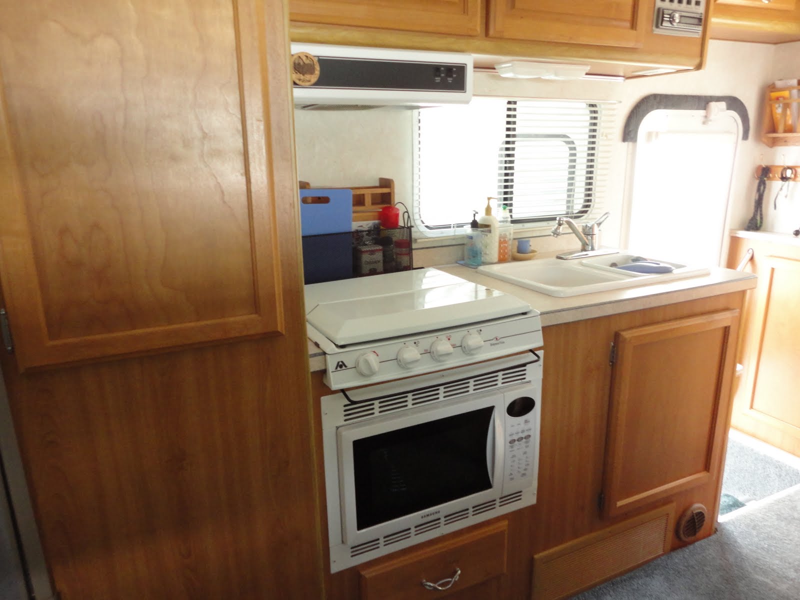 bathroom shower dimensions Kitchen area-double door fridge,3 burner stove and double sink