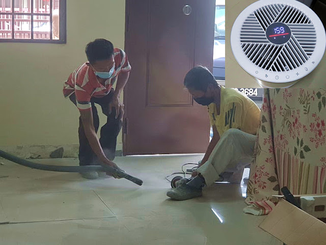 Air purifier showing bad air quality in the house