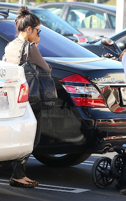 Kourtney Kardashian in Calabasas with Scott and Mason