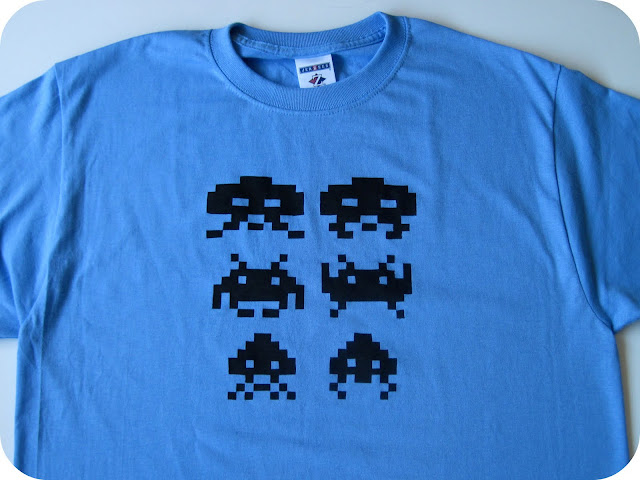 a freezer paper stenciled space invaders tshirt using this crossstitch