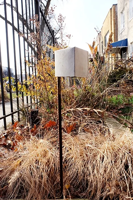 modern outdoor concrete and rebar solar light