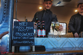 Serving drinks from the Vintage Airstream bar at the TISSOT NBA Finals Party Sydney - Photography by Kent Johnson.