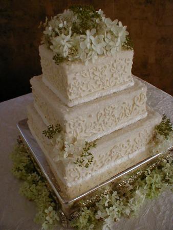 3 tier square elegant wedding cake with buttercream crystal sugar and