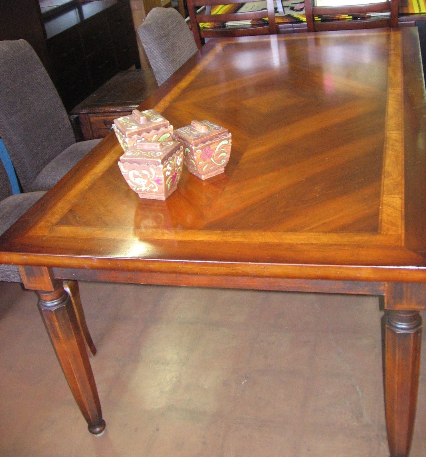 Big and beautiful! This warm and glowing wooden dining table was made  title=