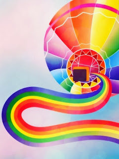 Hot air balloon and rainbow