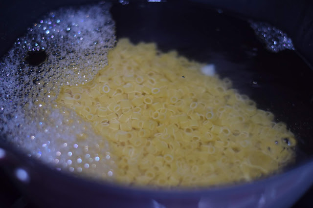 Pasta boiling in a pot. 