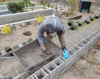 Bekir laying blocks